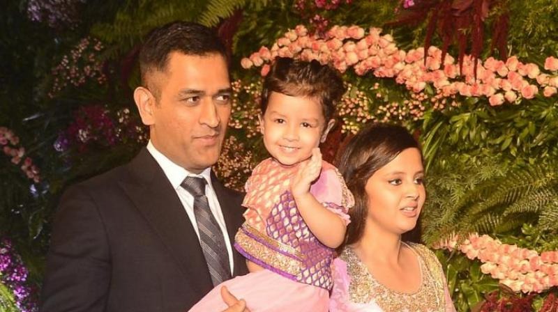 Dhoni with wife 